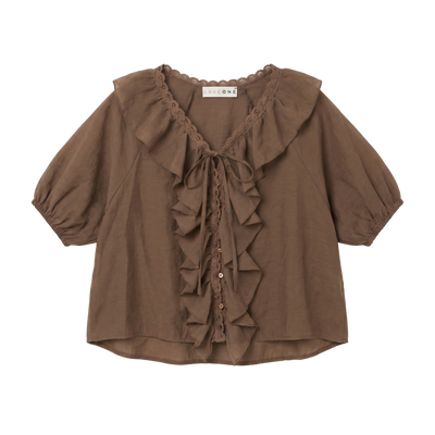 Blusa con volantes y lazo — Marrón moca